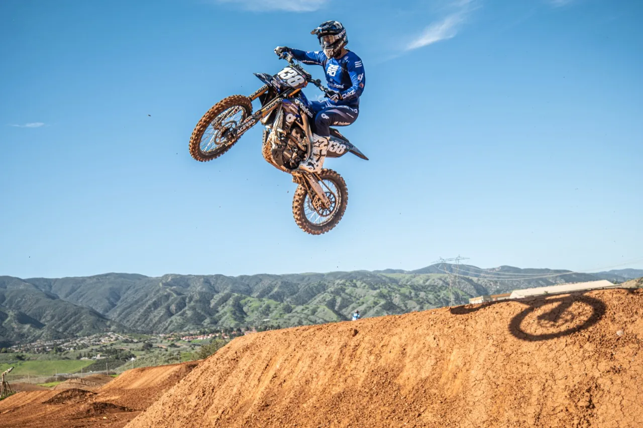 David Pulley Jr. jumping his number 138 motocross bike on an outdoor track